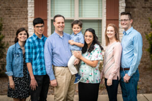 Group Family Photoshoot cute happy brick wall